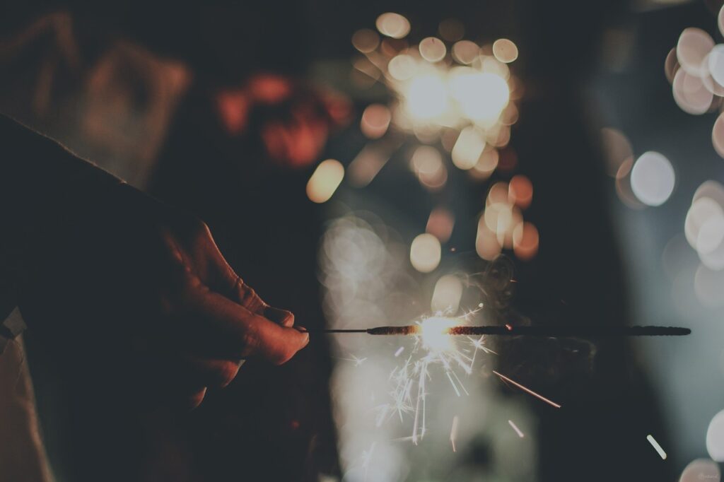 bokeh, firework, hand-1839984.jpg